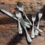 ONDE MIRROR FINISH Box set for 50 place settings solid handle serrated round blade
